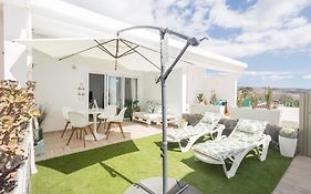 Bungalow playa Águila terraza piscina by Lightbooking